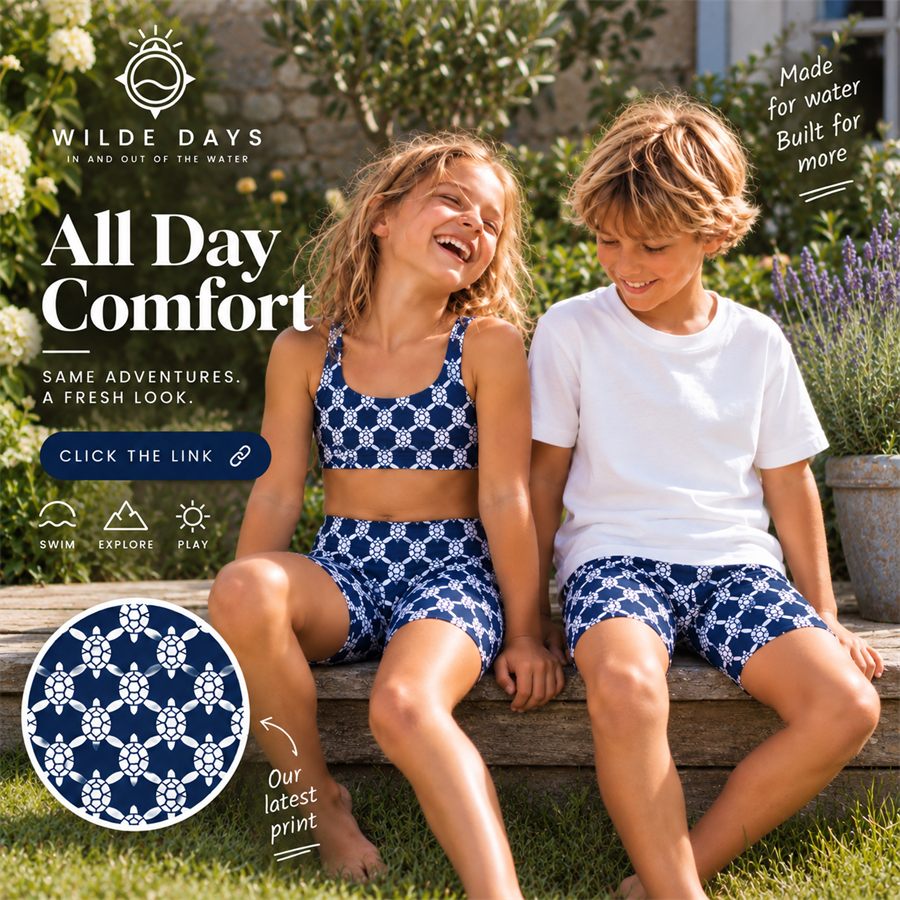 AI-generated visualisation: two children sitting on a wooden step in a garden, wearing navy turtle-print shorts and a matching crop top.
